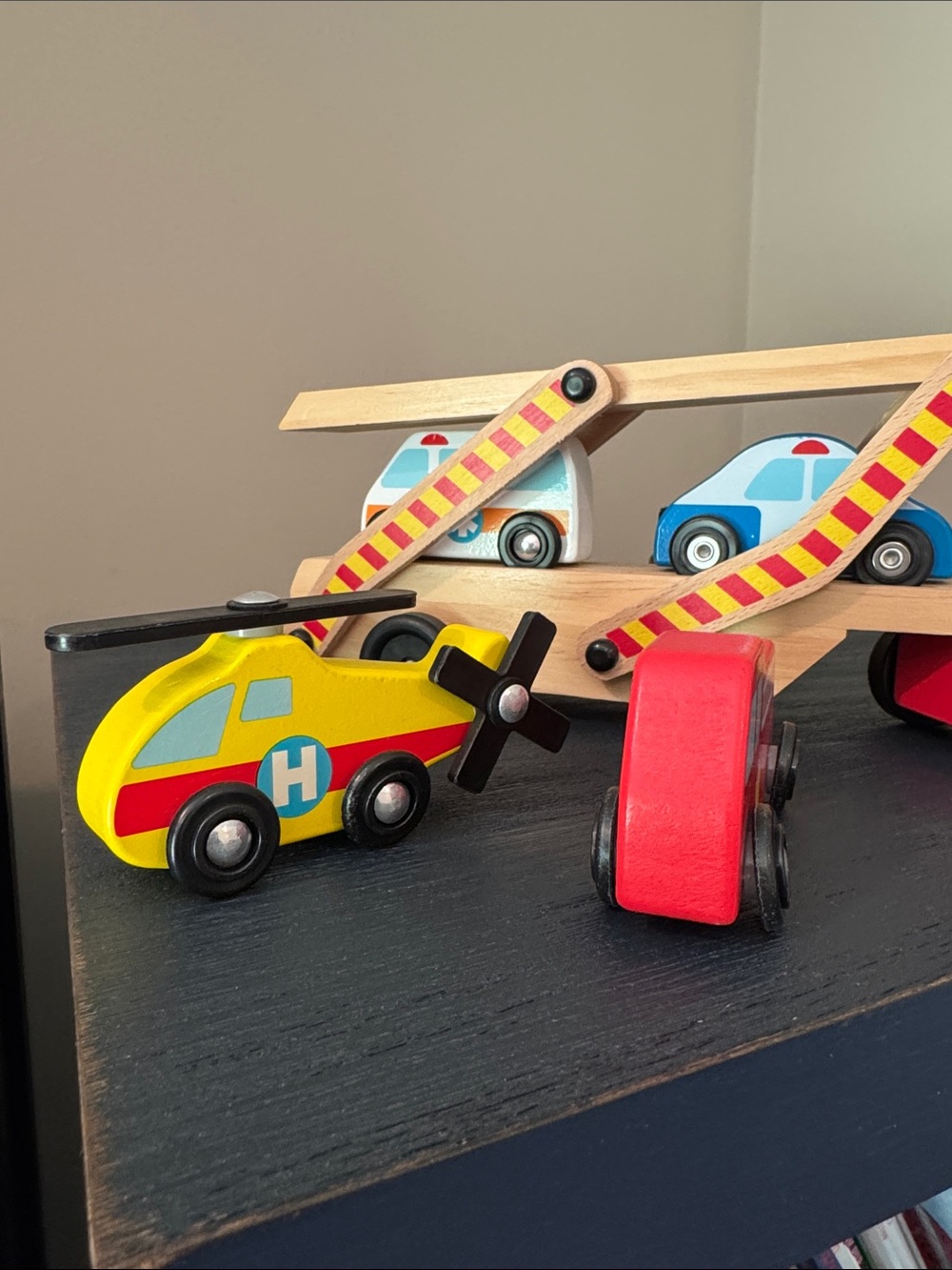 Melissa & Doug Red and Yellow Wooden Vehicle Carrier Playset - Picture 2 of 5